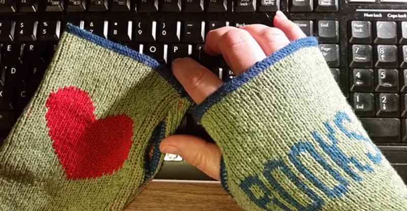 Fingerless gloves on keyboard