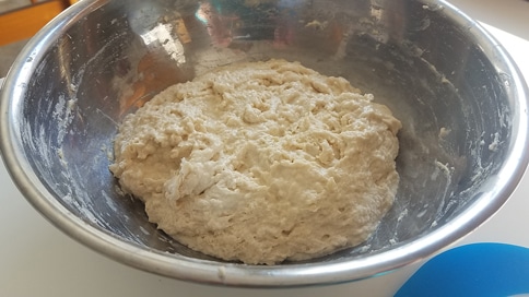 mixed peasant bread dough in bowl