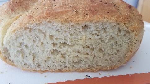 herbed peasant bread sliced