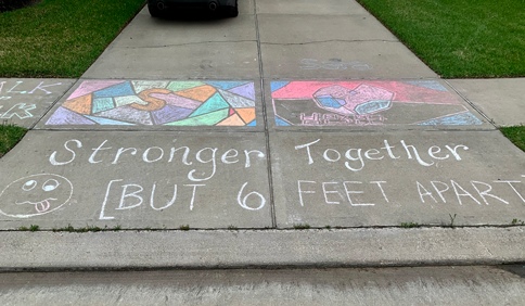 sidewalk chalk drawing stronger together but 6 feet apart